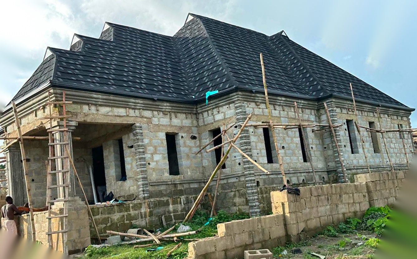 Roofing installation in progress on a residential building